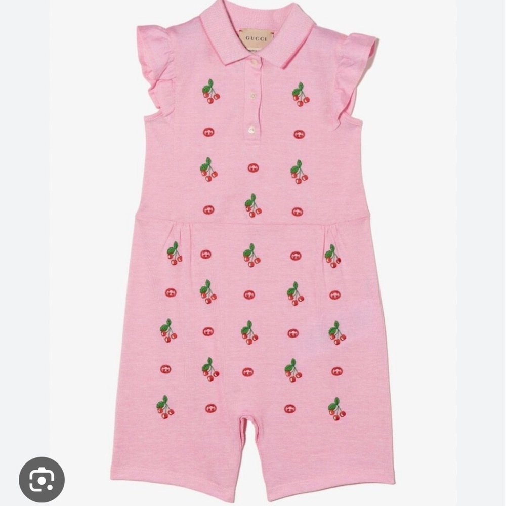 BRAND NEW with tags and box GUCCI onesie. Size 6-9 months.